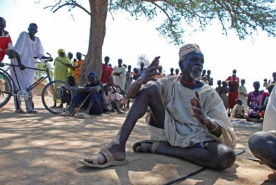 An elderly man from South Darfur describes an attack on his village that forced him to flee (Enough - Laura Heaton)